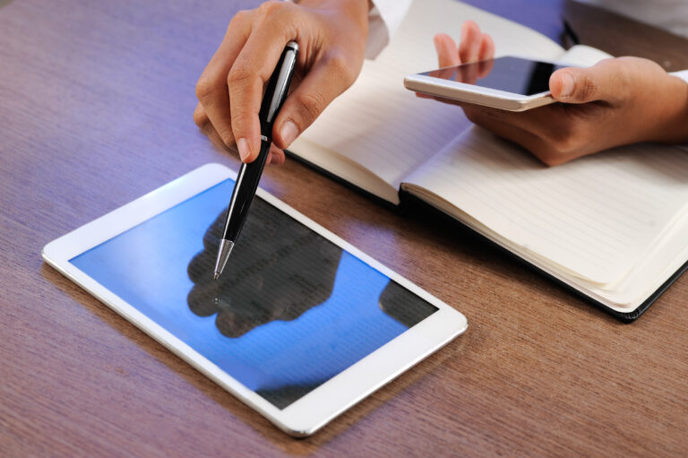 closeup person working using tablet smartphone Habit Ideas