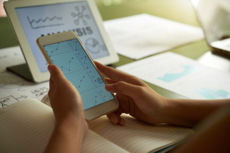 cropped unrecognizable person analysing financial chart smartphone Habit Ideas